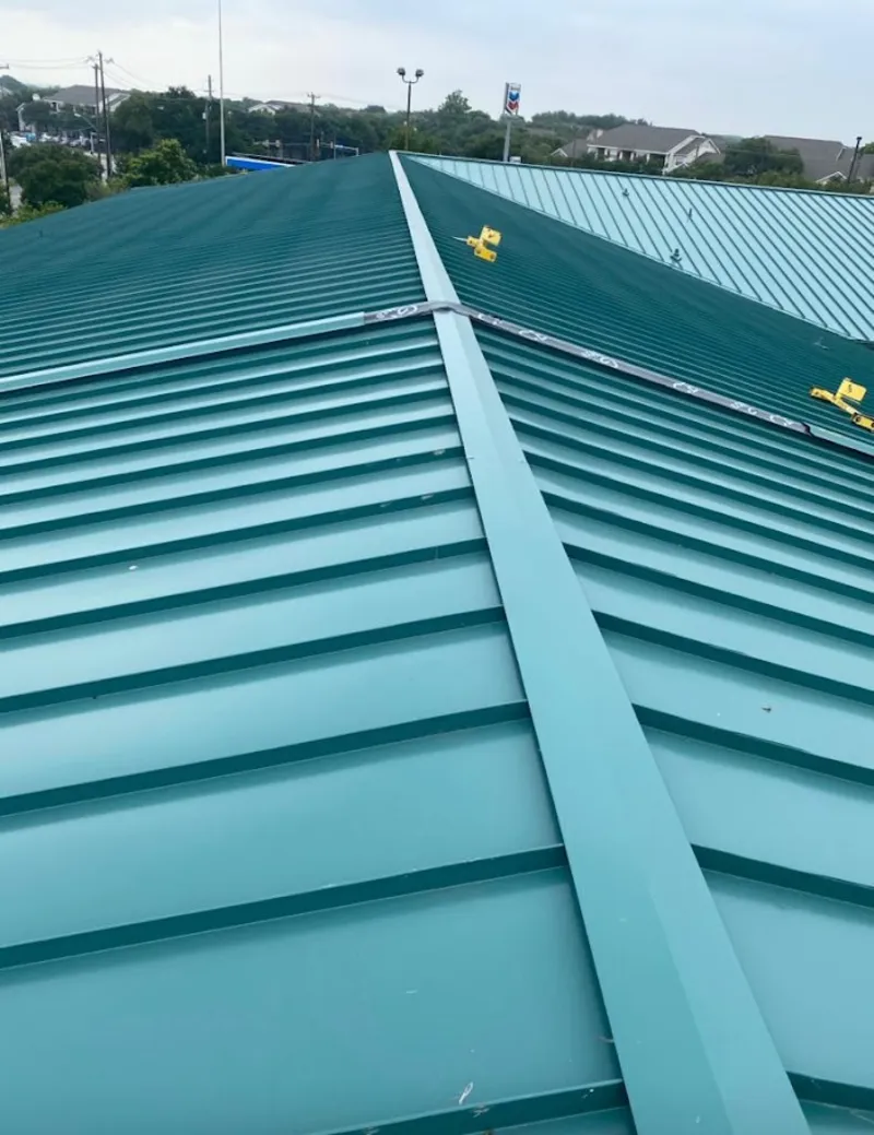 Green commercial metal roof ridge and valley for Metal Roof Repair in Edwardsville